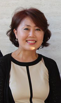 Mrs. Lee smiling