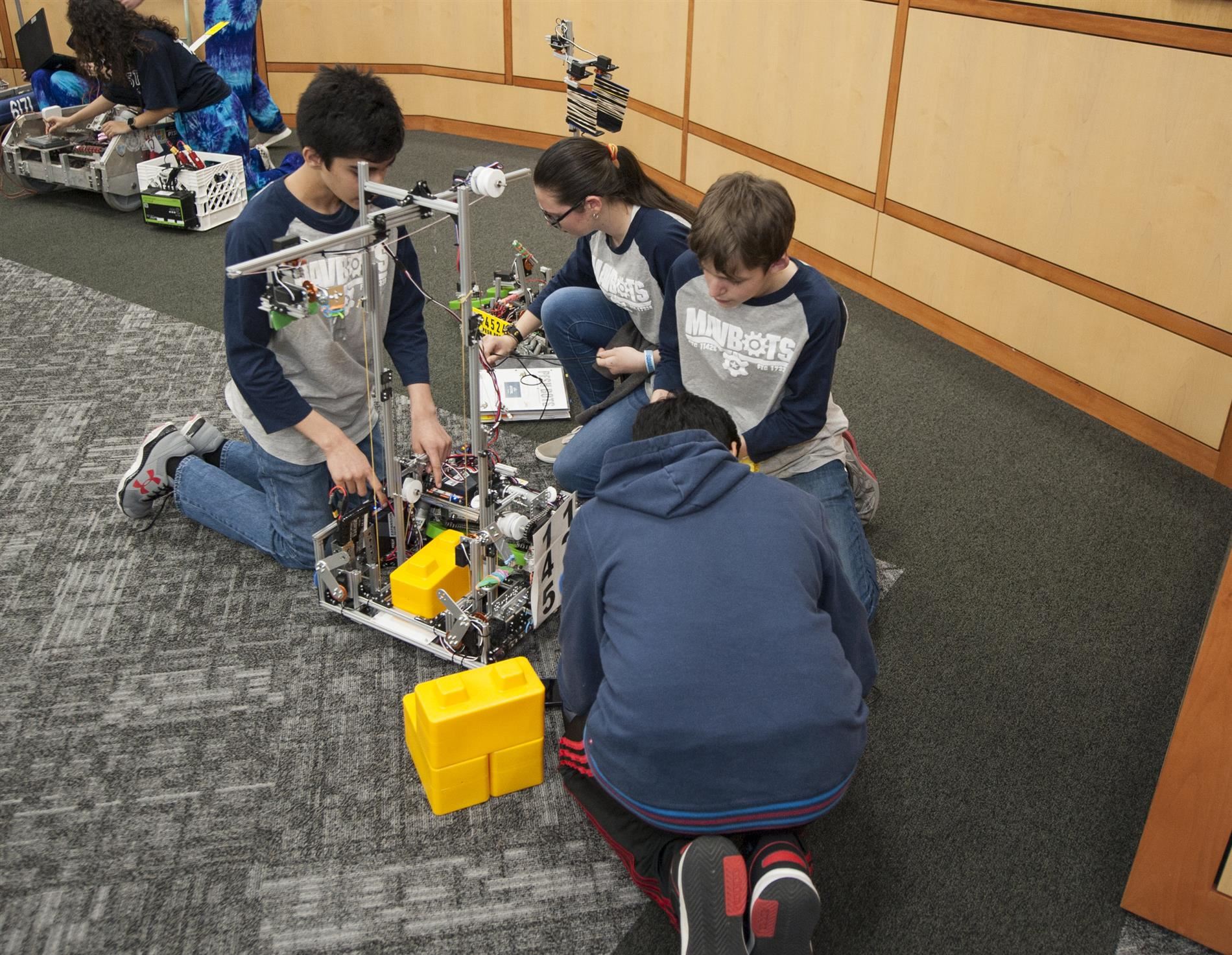 Murphy MS robotic teams shows off their robot to the board of trustees