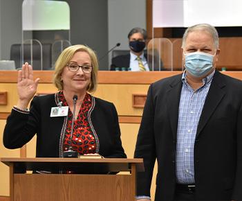 Trustee Nancy Humphrey hand on bible