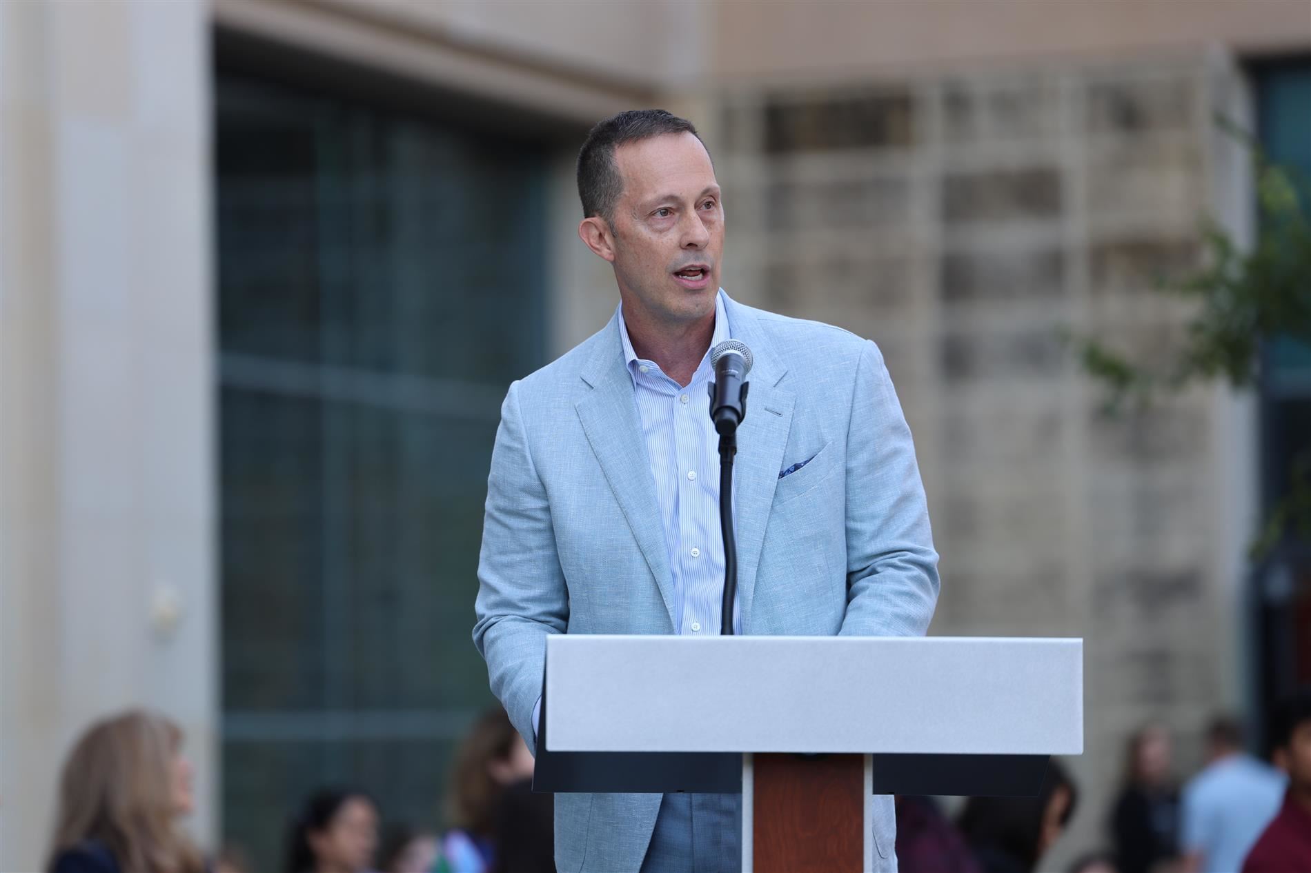 Toyota Financial Services CEO Scott Cooke speaking.
