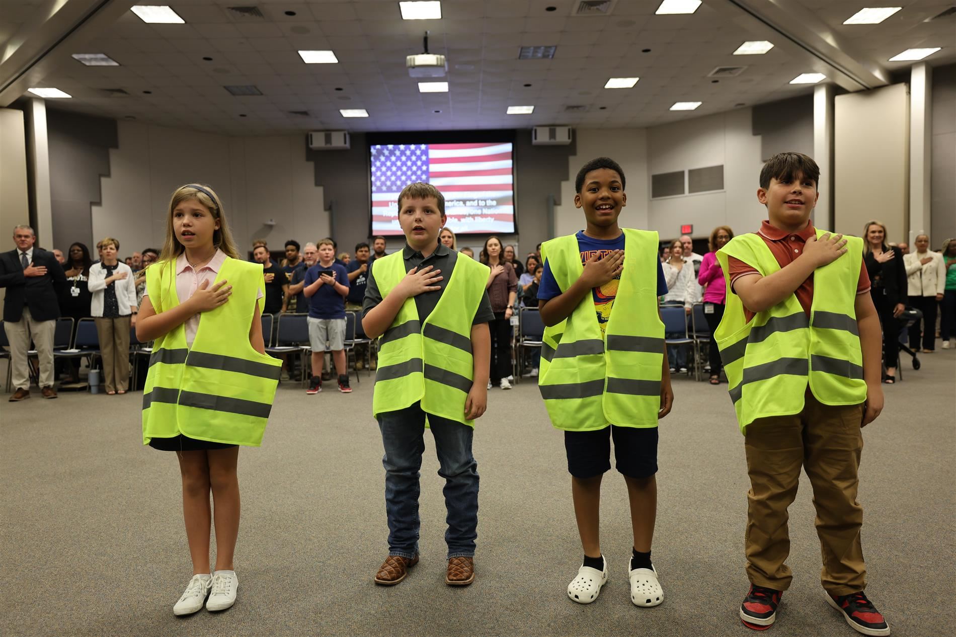 Students from Rasor Elementary School leading the United States and Texas Pledges of Allegiance