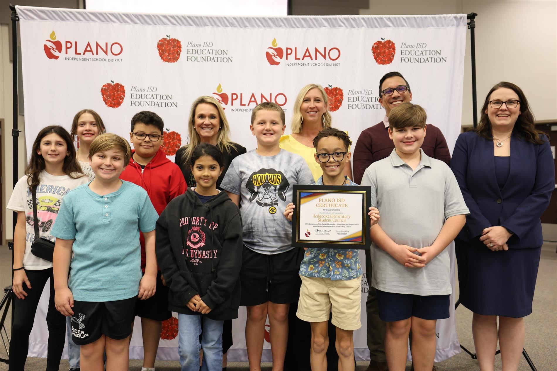 students and staff from Hedgcoxe Elementary School with Dr. Lauren Tyra