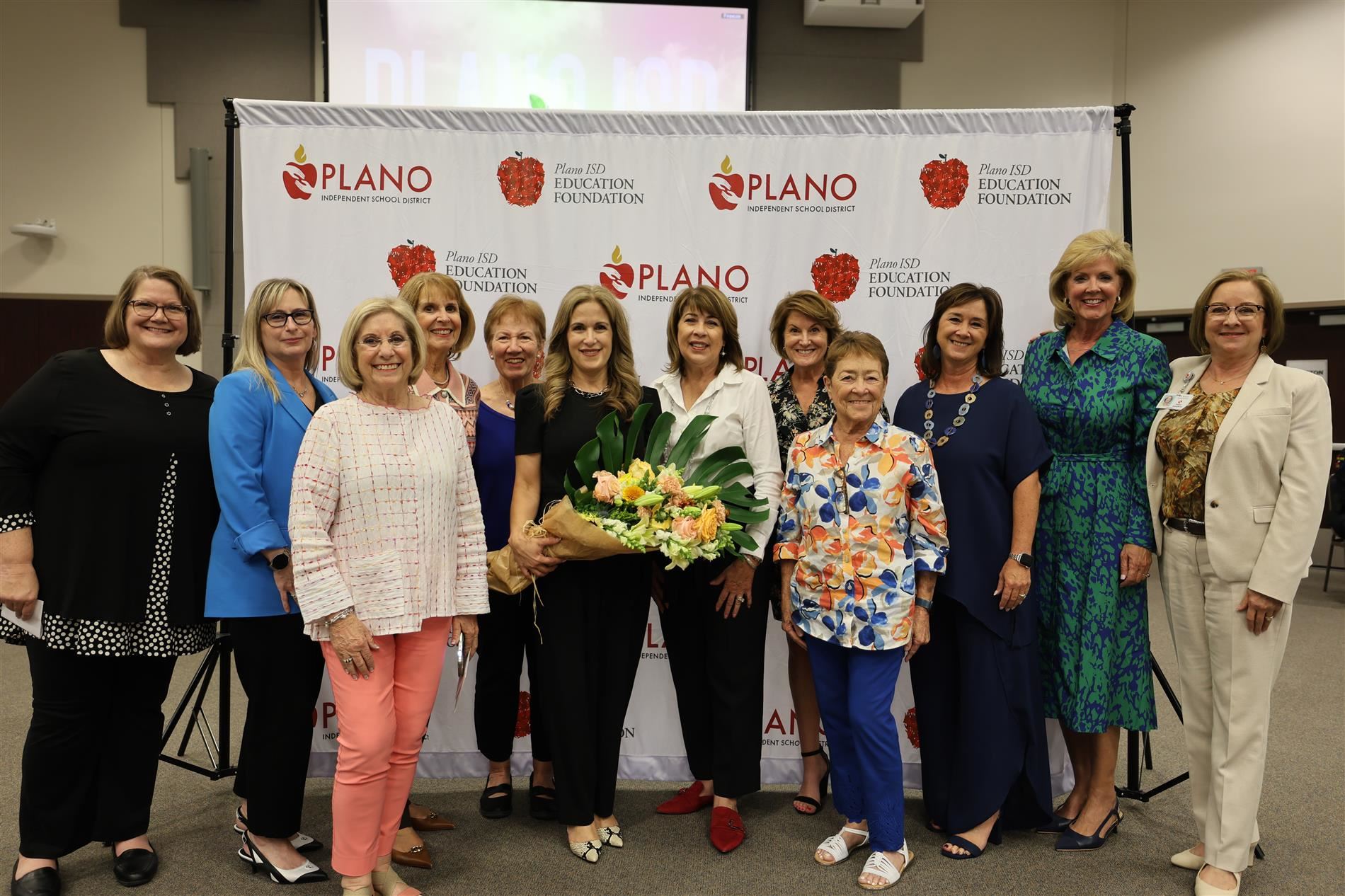 Image of Dr. Williams honored for 2024 Athena Award with previous recipients.