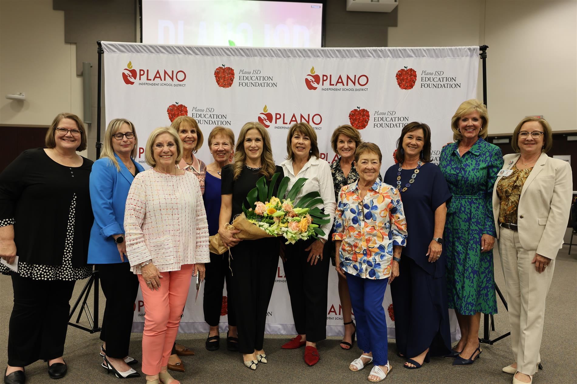 Dr. Theresa Williams (center) with previous Athena Award winners