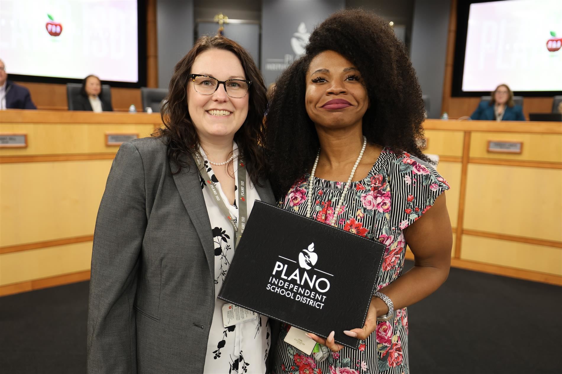 Board Vice President Dr. Lauren Tyra with Nastacia Kelly at the February board meeting