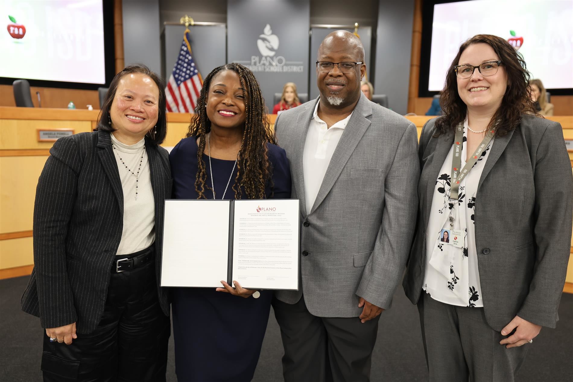 Trustee Angela Powell (left) with members of the Moses family and Board Vice President Dr. Lauren Tyra