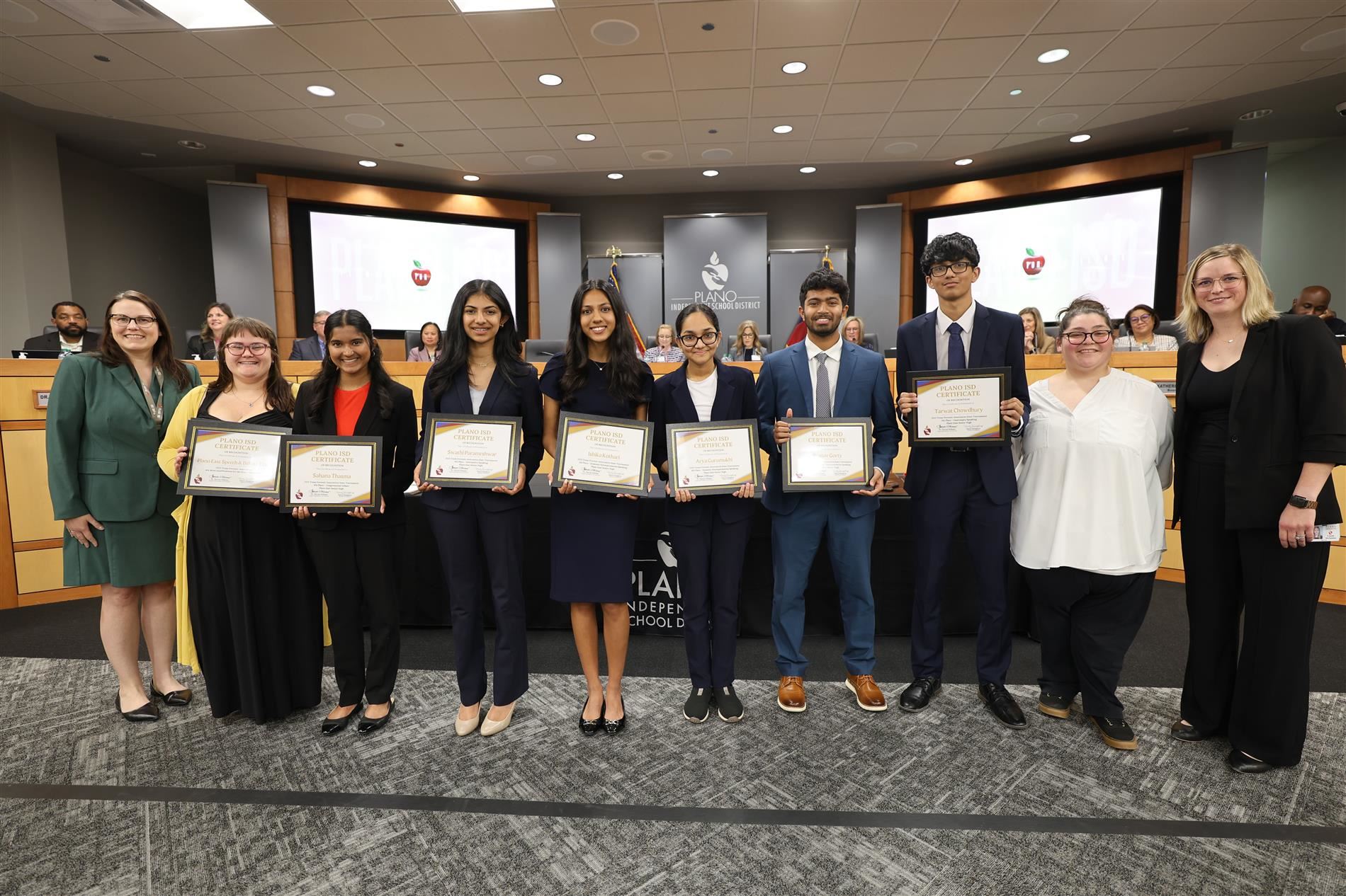 Plano East Speech and Debate team at the board meeting