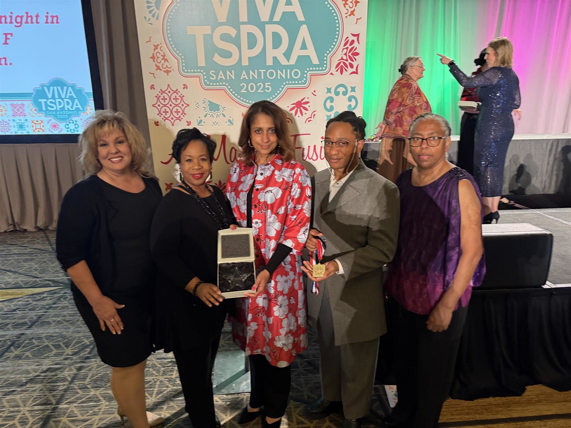 Plano ISD Communications Department representatives with TSPRA awards.