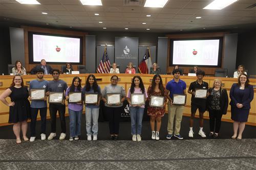 group photo of business professional of america tournament participants with recognition certificates