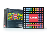 Small plastic blocks of various colored and cardboard box. 
