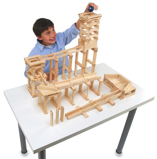 Boy playing with wood blocks 