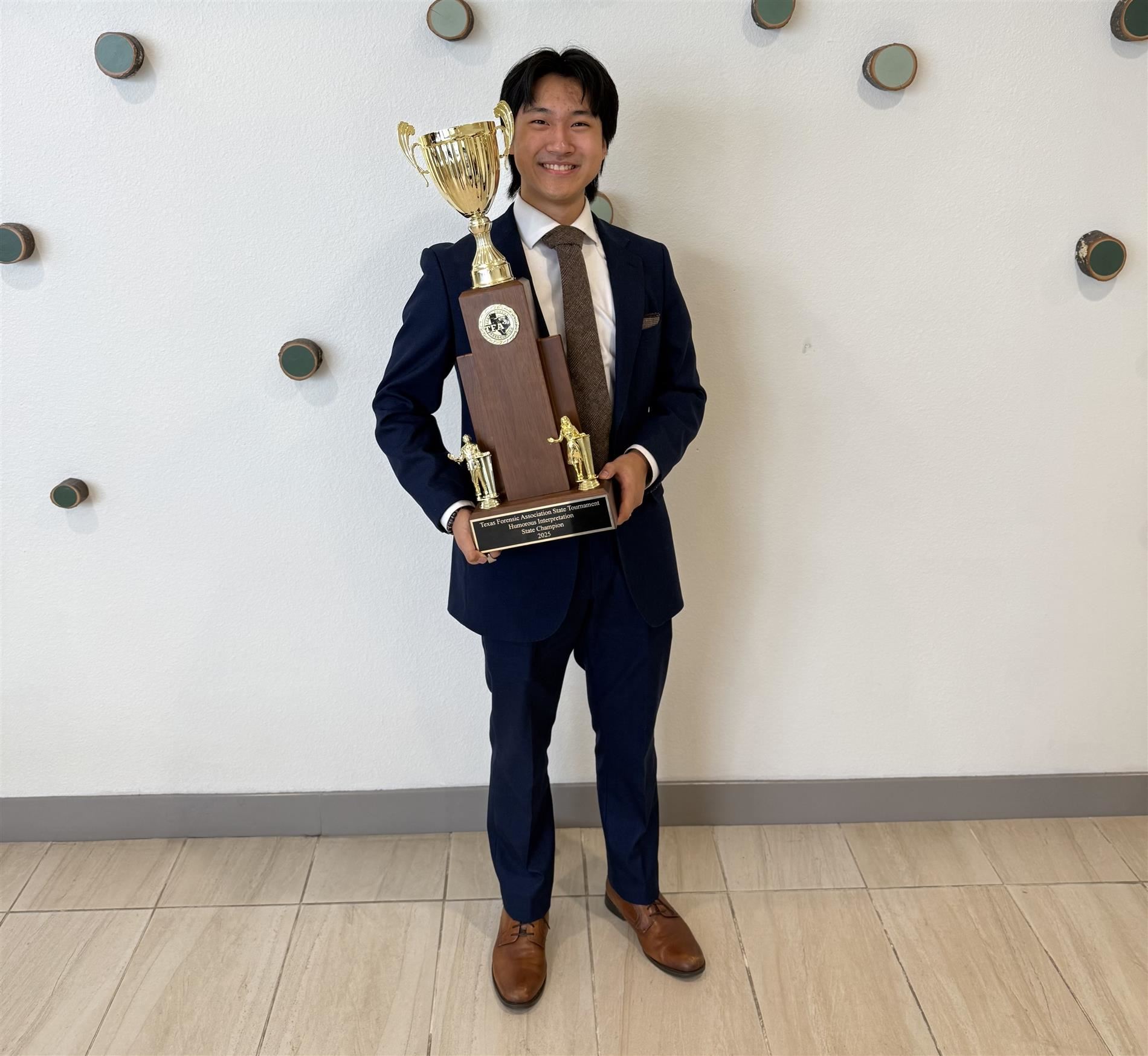 Image of Peter Yoon with his award.